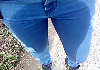 Pee around jeans open-air